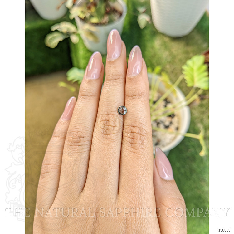 0.73 Ct. Brownish Green Sapphire from Madagascar