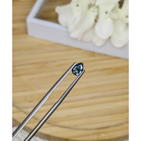 0.62 Ct. Greenish Blue Sapphire from Madagascar Life Style