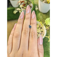 0.62 Ct. Greenish Blue Sapphire from Madagascar Life Style