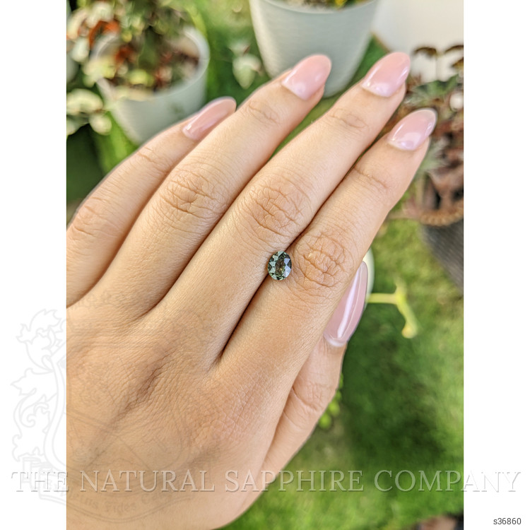 0.84 Ct. Brownish Green Sapphire from Madagascar