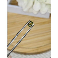 0.83 Ct. Greenish Yellow Sapphire from Madagascar Life Style