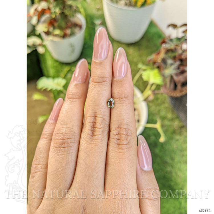 0.76 Ct. Yellowish Green Sapphire from Madagascar