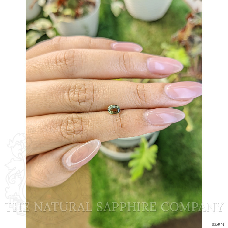 0.76 Ct. Yellowish Green Sapphire from Madagascar