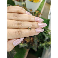 0.70 Ct. Yellowish Brown Sapphire from Madagascar Life Style