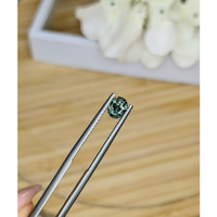 0.91 Ct. Green Sapphire from Madagascar Life Style