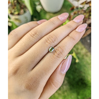 0.82 Ct. Greenish Yellow Sapphire from Madagascar Life Style