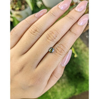 0.77 Ct. Yellowish Green Sapphire from Madagascar Life Style