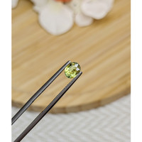 0.82 Ct. Greenish Yellow Sapphire from Madagascar Life Style