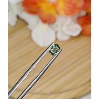 0.69 Ct. Green Sapphire from Madagascar Life Style