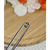 0.76 Ct. Greenish Yellow Sapphire from Madagascar Life Style