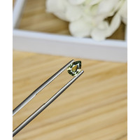 0.70 Ct. Yellowish Green Sapphire from Madagascar Life Style