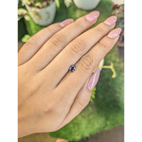 0.64 Ct. Pinkish Purple Sapphire from Madagascar Life Style