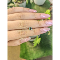 0.82 Ct. Yellowish Green Sapphire from Madagascar Life Style