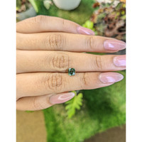 1.08 Ct. Bluish Green Sapphire from Madagascar Life Style