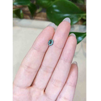 0.88 Ct. Green Sapphire from Thailand Life Style