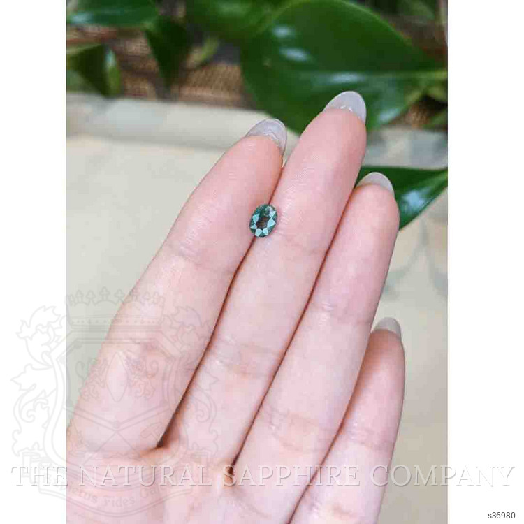 0.88 Ct. Green Sapphire from Thailand