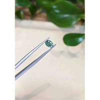 0.88 Ct. Green Sapphire from Thailand Life Style