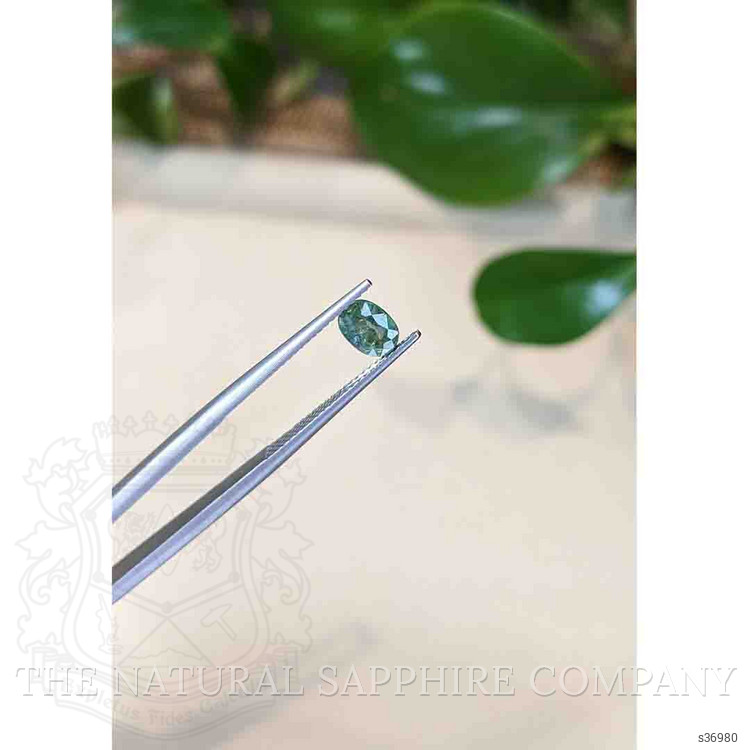 0.88 Ct. Green Sapphire from Thailand
