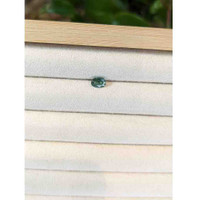 0.88 Ct. Green Sapphire from Thailand Life Style