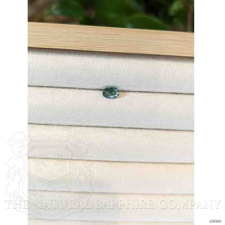 0.88 Ct. Green Sapphire from Thailand