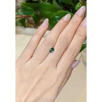 0.84 Ct. Bluish Green Sapphire from Thailand Life Style