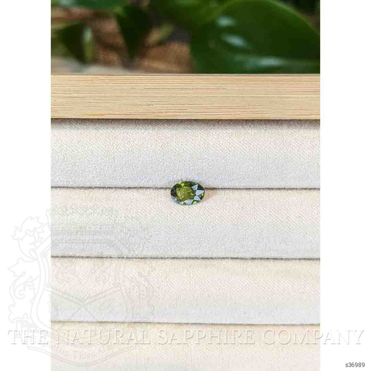 0.92 Ct. Yellowish Green Sapphire from Thailand