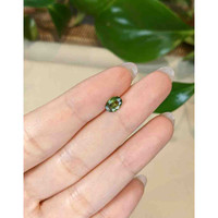 0.92 Ct. Yellowish Green Sapphire from Thailand Life Style