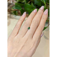 0.61 Ct. Green Sapphire from Madagascar Life Style