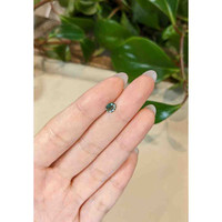 0.66 Ct. Bluish Green Sapphire from Madagascar Life Style