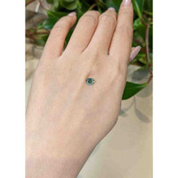 0.66 Ct. Bluish Green Sapphire from Madagascar Life Style