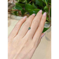 0.53 Ct. Green Sapphire from Madagascar Life Style