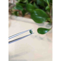 0.53 Ct. Green Sapphire from Madagascar Life Style