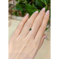 0.54 Ct. Green Sapphire from Madagascar Life Style