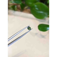 0.54 Ct. Green Sapphire from Madagascar Life Style