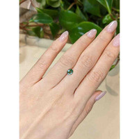 0.75 Ct. Bluish Green Sapphire from Madagascar Life Style