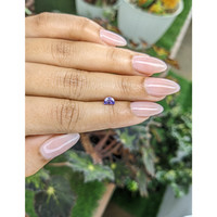 0.57 Ct. Pinkish Purple Sapphire from Madagascar Life Style