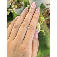 0.47 Ct. Peach Sapphire from Madagascar Life Style