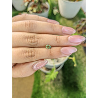 0.60 Ct. Green Sapphire from Madagascar Life Style
