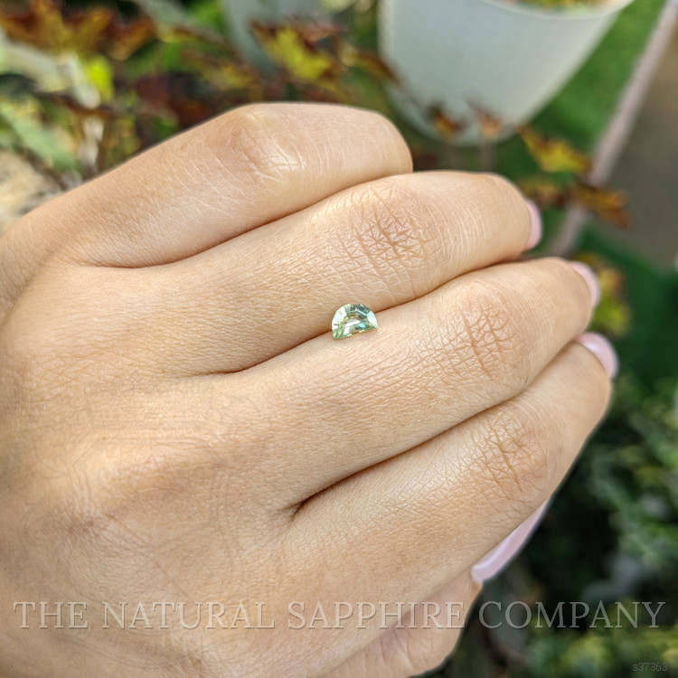 0.49 Ct. Yellowish Green Sapphire from Madagascar