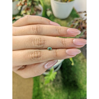 0.43 Ct. Bluish Green Sapphire from Madagascar Life Style