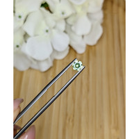 0.57 Ct. Yellowish Green Sapphire from Madagascar Life Style