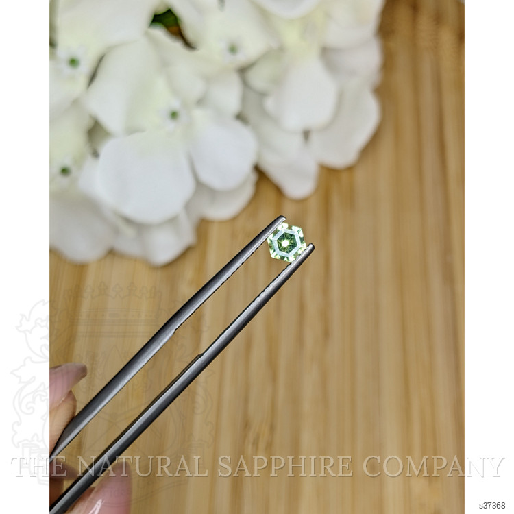 0.57 Ct. Yellowish Green Sapphire from Madagascar