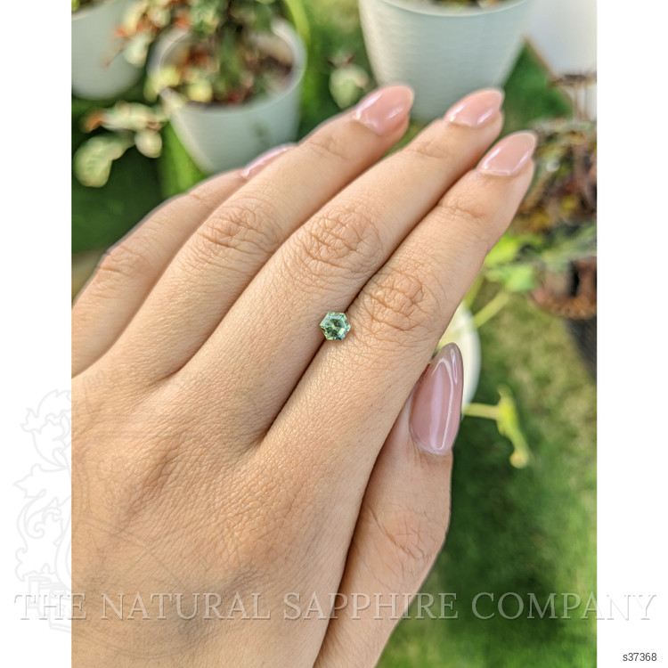 0.57 Ct. Yellowish Green Sapphire from Madagascar