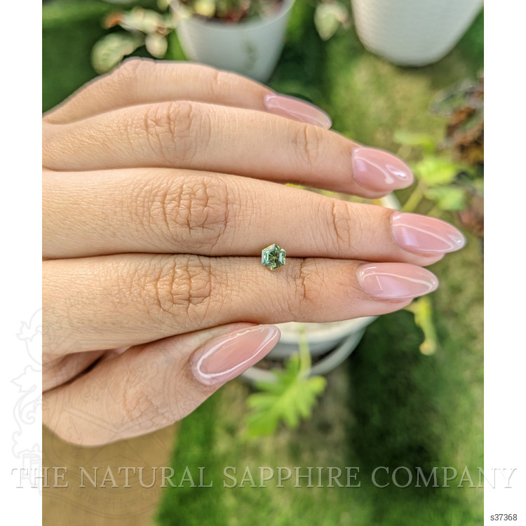 0.57 Ct. Yellowish Green Sapphire from Madagascar