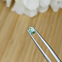 0.49 Ct. Bluish Green Sapphire from Madagascar Life Style