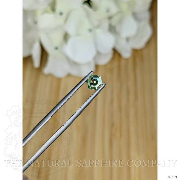 0.75 Ct. Yellowish Green Sapphire from Madagascar