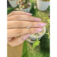 0.61 Ct. Peach Sapphire from Madagascar Life Style