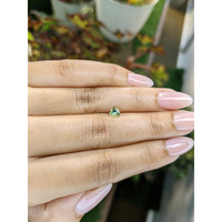 0.44 Ct. Yellowish Green Sapphire from Ceylon (Sri Lanka) Life Style