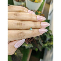 0.44 Ct. Yellowish Green Sapphire from Ceylon (Sri Lanka) Life Style