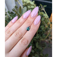 1.64 Ct. Bluish Green Sapphire from Madagascar Life Style
